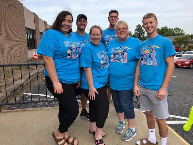 Day of Caring volunteers posing for a photo